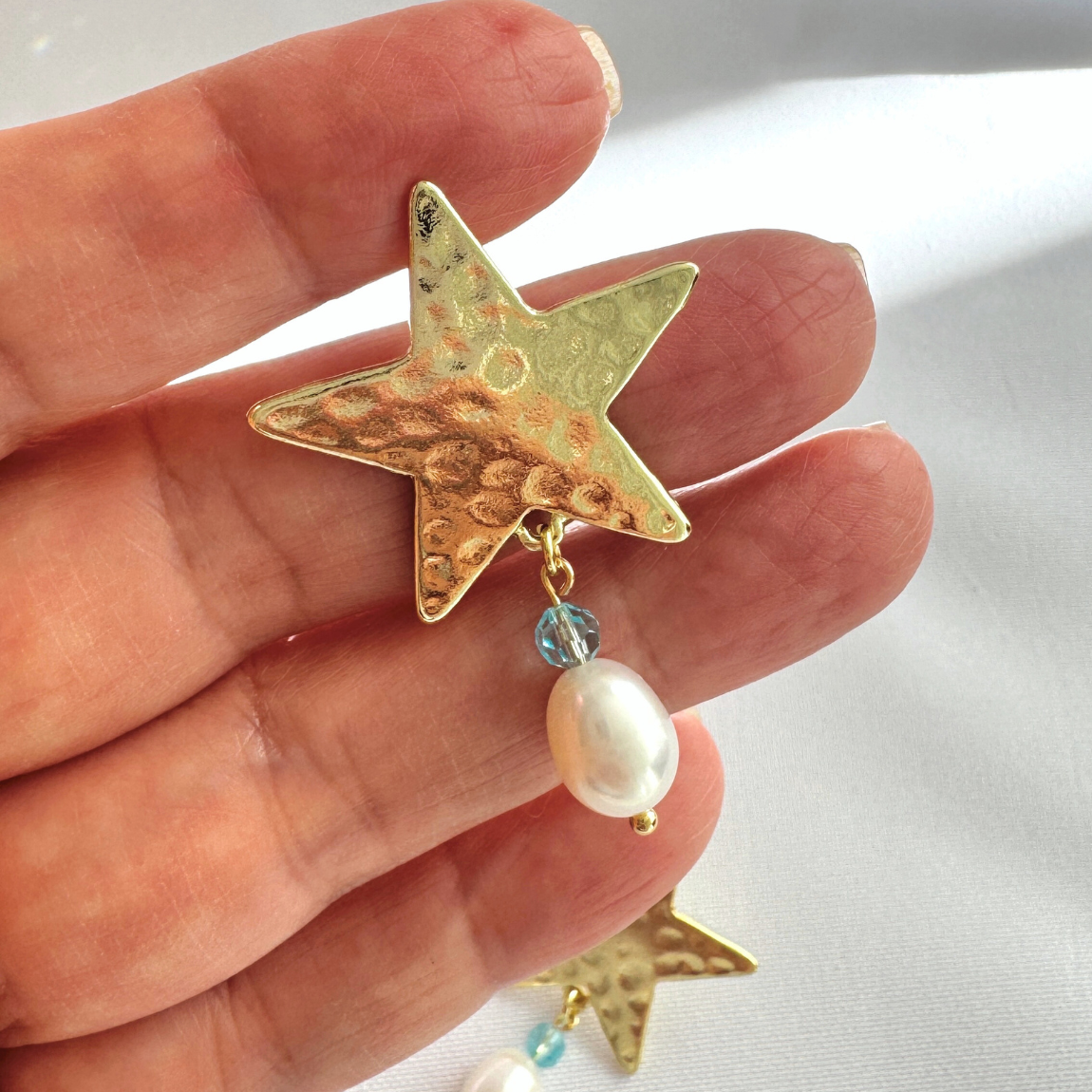 Aros Estrella Martillada con Perla y Cristal Swarovski